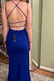 I got so many compliments on this beautiful dress. The color is vibrant and the back detail is stunning. The material is thick and well-made. I'm 5'8 and the length was perfect on me. Will definitely be ordering more from Lulus! This dress is perfect! - Reille A.