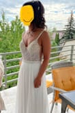 I wore this dress to my wedding and got so many compliments, some saying it was the most beautiful wedding dress they'd ever seen. I felt like a princess in it, and the quality was very good.

I had to have the straps lifted bc I'm a shorty and of course hemmed too. My seamstress added a button on the back so the train could be lifted for dancing.

I'm between size 4-6 but went with the 6 and am pleased. - Ani T.
