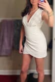 Thick materal, not see through at all. No need for bra (I taped). A little short, but I'm tall so that happens for me. Would recommend. Can't wait to wear again. - Stacy B.