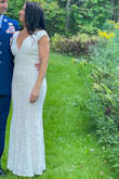 This dress was simple, but absolutely stunning! The right mix of beautiful with a hint of sexiness with the low cut front and back. Complimented my curves and just a gorgeous dress!! - Naomi Z.