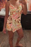 Most reviews have been mixed but I'm here to tell you that this romper is so cute!! The colors are vibrant, the fabric is light and airy (it wrinkles easily but the pattern makes it unnoticeable), and IMO it's true to size. I like that the romper makes it more versatile and has a unique design. I bought this for a trip to Belize in January, but I've already been wearing it cause it's just too hard to save for later! - Lauren B.