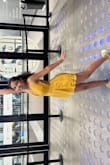 Lulus never disappoints me. The dress is mustard color with beautiful crochet work in the front. Straps are adjustable. Worth buying ! - Vasudha S.