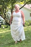 Absolutely loved this dress! Was perfect for my outdoor wedding. Dress was too long for my short frame, but was able to get it hemmed at local bridal shop. The alteration cost more than the dress! Love that the straps were adjustable. They stayed in place throughout the day and evening. I have nothing bad to say. This dress is awesome! - Lori P.