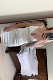 Got this for my second dress for my wedding. Needed something fun and sexy to wear out for after the reception. This dress fits cute and is definitely sexy! It is a brighter white than silver, which is hard to tell from the photo online. It's pretty short for those of us with lower body curves! But all and all it's super cute. - Lisa D.