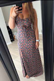 Love this dress as it's very different from what I usually go for. I ordered it in a small and a medium. The small is VERY tight across my bust and back (34D), but the medium was just too loose everywhere to keep. The fabric doesn't have any stretch to it, but I'm hoping it will give a little bit as I like this dress too much to return it. You can see in the second photo how it makes my boobs look like pancakes. I really wish there was a size that catered to hourglass figures because I'm beginning to think this body type is a curse! - Alaina Q.