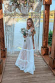 Perfect dress for an elopement! I wanted something boho and pink and this was perfect. Being 5'1 I did have the dress hemmed but left the overlay long. Very happy with it! - Michelle B.