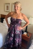 This dress is so beautiful but when I tried it on I could not zip it up.  Ordered a XL and it fit much better but was a bit big so I also pinned it to my strapless bra and felt comfortable in it!  Many many compliments wearing this and many many people asked me where I bought it!  Had to tell them of course! - Stephanie M.