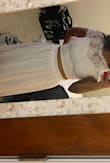 Hits great I'll be wearing it for my wedding I am very short so I always have to get things taken up. But nice quality and FAST shipping! - Melissa M.