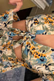 I ordered a medium because I have hips and a butt and knew that my waist might be a little big but the waist is huge however if I had ordered the small there's no way it would go over my hips. If the fabric just had some stretch it would be a piece worth purchasing but the fabric is so cheap. And now I'm stuck with it bc it's all sales final &.. beyond annoyed. - Elise M.