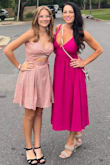 I bought this dress to wear to the Mean Girls musical with my daughter.  I got a ton of compliments on it at the show!  It fit me perfectly and was very comfortable.  The pockets and bow in the back were a cute touch. - Adrienne S.