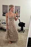 This dress looked flattering on me even though it's a maxi and I am not on the tall side. Sometimes I get lost in longer dresses but this was just right. Loved the print and base tan color too! I'll get many wears out of it! I wore it to a bridal shower. Love love love! - Danielle R.