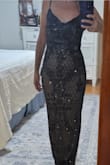 Beautiful dress fits great. I didn't need alterations. I am usually a size 2 or 4 and the small fit perfect. - Beatrice F.