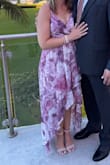 This dress is the perfect dress, I love the high low length and the quality is top notch. Being 5'2 I for sure thought I would need to get this hemmed, but my 2inch heels were all I needed! This dress is everything I was looking for! - Lauren C.