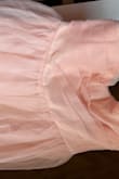 I loved the quality of the dress, but it's not blush pink as advertised, it's a light peach color. - Bella C.