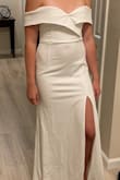 Beautiful dress, felt cute and fun but ultimately didn't feel fancy enough for my wedding gown. Would buy in another color! And could be great for another wedding style. I have a smaller bust so would need that altered. Also does limit arm range of motion slightly but I would just hike that part up on the dance floor! - Lisa B.
