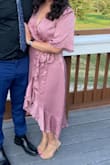 This dress is stunning! I wore this dress to a wedding at the beginning of September and got so many compliments on it! It is very flattering and I love that it has a slip underneath so the wrap part doesn't reveal anything. I also purchased it in the dark green and both colors are gorgeous. - Rebecca B.