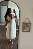 I LOVE THIS DRESS. It may be my favorite piece, I wore it for my engagement party and it was so dreamy. The only issue I had was that the shoulders kept falling down and I had to wear a lot of boob tape. But if I would've ordered a medium, the waist would've been too small. - Aubrey W.