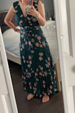 The top is very loose and hanging, almost like it comes down a few inches too low, and the ribbon ties at an awkward spot. If you could pin it up it would feel better. The pattern is very pretty and other than being loose at the top it's nice. - Heather R.