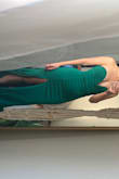 This dress is amazing you must get it!! The green color is so elegant, so is the sweetheart shape. It has a wire in the deep cleavage area that keeps the shape and the boobs in. So my tiny boobs looked amazing because I could pull them toward the center and the dress pushed them and kept them in place (so no bra needed). This dress also perfectly hugs my curves and the leg slit is super sexy without compromising elegance! I did have to alter the length since I'm super short.
Overall, very impressed with the fit. - Ana M.