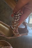 I bought these for a wedding. My dress was long since it was formal attire. The crystals kept on getting stuck to my dress and would fall off when removing the fabric from it. I had them on for maybe 2 hours before changing into a different pair. - Amber B.