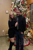 Very form fitting with a lot of stretch. I paired it with a pair of thigh high lace up boots I also purchased from lulus. I shop based on style and comfort. If I have to pull on it I don't buy it. This dress stayed put. If you are worried about length, it is pretty short. - Caryn H.