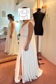 The dress is beautiful and the quality is AMAZING. Really, I was surprised. I would choose this dress model again a thousand times. Makes me feel like a greek goddess. The size was huge. I chose size n 8 based on the table measurements. It was too big for me. But it's okay. I prefer too big to too small! I took it to get it fixed and now it's perfect. - Paula L.