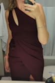 Loved this dress and got lots of compliments! Wore it to a wedding and it was very comfortable and good at disguising my sweat from lots of dancing lol. My only complaint is that the leg slit was a bit too revealing for me. But I am 6'4'' so maybe it would be less extreme for others. The material is super stretchy and flattering! I typically wear between an M and L and got an M for this dress and it fit like a glove. - Sophia C.