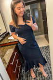 I am 5'3" and 162ish lbs. I carry most of my weight in my belly and wear a 38B bra. This dress was very flattering. I'm normally not comfortable wearing anything form fitting due to my broad shoulders and rounder belly, but I felt great in this and got lots of compliments. It was slightly longer than I would've liked and I probably could've helped that by going down to a medium. My hips are actually pretty narrow so I didn't fill out the bottom part as much as I would have liked. Either way, if you're thinking about this, go for it. Very pretty and great quality for the price point. I used a discount code. - Megan W.