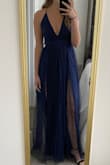 It's a bit long, but my 2-inch heels were fine. 3 might've been better. Overall gorgeous & comfortable. - Shayna V.