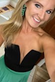 I ordered this for a special event and dressed it up with a long skirt. I got compliments all night long. I have a long torso so it was a little tight being a bodysuit. I used fashion tape to help keep it in place. - Emily B.