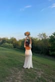 I love it. If you are looking for something simple, sexy, and elegant at the same time, do not think too much to buy it. Thank you Lulus. 
Perfect. Stretch, very sexy, and elegant at the same time.  I fit perfectly in my pregnancy a size XL. I love my dress. - Lidia C.