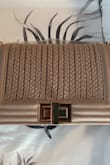 So cute, but definitely darker than it appears. Still a great bag! - Melissa R.