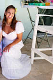 I wore this as my wedding brunch dress on Easter and it was very flattering, and my Mexican family loved the style. The waist is a little tight, so I would recommend sizing up if you're concerned about eating or dancing a lot while wearing it. And fabric tape helped the bust line stay family-friendly. - Carla R.