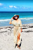 Such a cute cover-up! I wore it when I visited my hometown in Florida and got tons of compliments. The fabric is light, iridescent, and not overwhelming in the heat, but it does run large because of the elastic waist. It's also long and flowy, so it could be cumbersome if you're carrying a lot through the sand. Other than those couple of things, it's lovely! - Carla R.