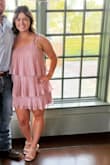Loved the dress! Ordered a Large to begin with and it fit fine but seemed a little short. Decided to go up a size to see if that would help! I was much more comfortable in the XL. The best thing about the dress is that it isn't tight, but it also doesn't look frumpy! - Lauren H.