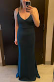 I bought this dress for a wedding and couldn't be happier! The material is a good thickness and relatively stretchy, so a medium fits perfectly. The silhouette is super flattering and it doesn't show too much cleavage. The only thing is that it was a tiny bit on the long side, but I didn't notice too much during the event. Highly recommend! - Miranda F.