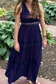 Wore this to a wedding and loved it! It was very flowy and looks cool when you spin on the dance floor. There is an inner lining that is a little restricting when walking. Also, the part that runs small is the rib cage where the lace part is. It was tight but not tight enough to go up a size for me. - Nicole H.