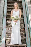 I absolutely loved this dress for my wedding!!! I did get it altered (straps taken in & length). It was perfect for my small wedding. - Alivia C.