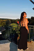 This dress surpassed my expectations! I was nervous about being/feeling supported because I have a large chest (38H), but it fit like a glove! I received so many compliments on this dress, definitely recommend it. - Samantha A.