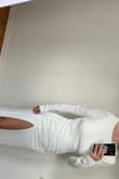 I liked this dresss but the slit did go a little too high I think. It's very comfortable and beautiful open back. - Andrea B.