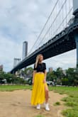 This is my sweat favorite go-to skirt! Even with sneakers, it makes me feel classy. The material is light but not see-through. Wrinkles easily- but doesn't look terrible with some wrinkles- unlike some materials. Lovely addition to my closet! - Ryahjoy L.