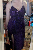 This dress fits amazing and is so fun. The lining on the inside kept it pretty comfy and there was minimal arm-scratching by the sequins. The slit it pretty aggressive but otherwise I love it and got so many compliments! - Alison K.