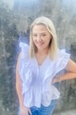 This top was so cute on, but I did not feel comfortable wearing it without a tank top under it. It was a little tight in the chest for me, but still worked. The hook and eye could be see through for a bigger bust and the type of fabric has no give to it. - Hannah B.