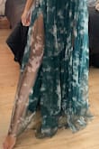 I am OBSESSED! I ordered it for a beachside wedding and also to wear in Greece for my honeymoon. The back is a TAD loose but I'm 5'8 with 34B top and it's very complimenting. - Cassandra C.