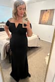 This dress fits like a GLOVE & flatters every curve. I usually wear size 12 and am happy I purchased a size Large. I've breastfed two babies and the girls look fabulous. I could go without a bra or with a strapless and it looks good both ways. The sleeves are the only part that I would consider not true to size; they're probably more like Medium. But not restrictive enough to make it uncomfortable. I'm for sure going to have to hem it, but I plan on keeping the back length and hemming just the front so I don't trip while wearing heels. - Sarah P.