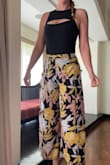 I wore these for my brothers wedding rehearsal dinner at a boardwalk. They were very comfy, and allowed airflow while still being more conservative than other ultra high slits. When I bought them I thought that each leg was connected to itself at the bottom, but they are definitely not connected. I was surprised at how much of my leg showed when I sat down, but I wasn't uncomfortable and my underwear stayed hidden!! Then I got lots of compliments and I'd be surprised if my mom doesn't steal them. I love these pants. - Britt F.