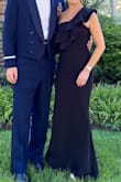The stretch double layer helps hide body imperfections. I received many compliments. I did have to get it hemmed. Very fitted. Tight around chest wall but medium gaped under arm. Small was perfect. - Jennifer G.