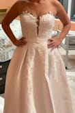 I could not be happier with my dress. The only thing I took one star away for was the slit in the side, it goes soooo far up. Gorgeous dress and even more perfdct in person - Chantel P.