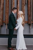 Absolutely loved this dress. Wore for my wedding and I would do it again a million times over. It did need some alterations (brought in the shoulders, lined the top, shortened, etc.) but I cannot express how much I loved this dress. - Abbey W.