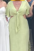 This dress is super cute and such a great color!!!! I do believe it runs TTS, I am unfortunately in between a L and an XL. I wish the L was available for purchase as that's what I would have preferred. It fit well in the bust and was loose all through the rest. The length was perfect and came about mid-calf on me.

I wore it to my sister's wedding and noticed in photos that the cutouts were uneven, so that's annoying to look at and I will be getting it altered to better match. - Heatherly N.